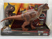 Packaged Carnotaurus dinosaur figure from Jurassic World: Fallen Kingdom with lights and sounds features visible on the box.